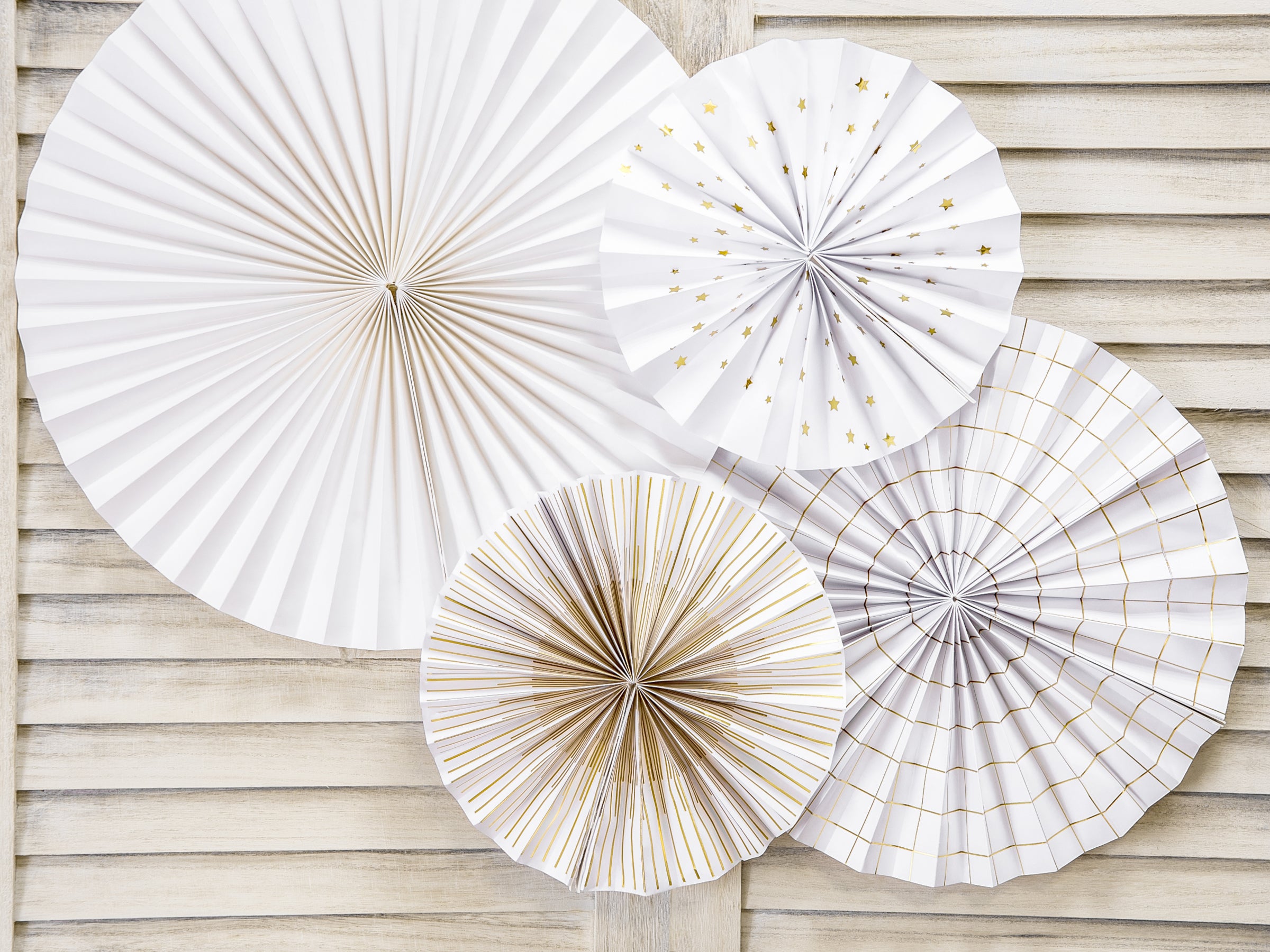 4 rosaces en papier blancs