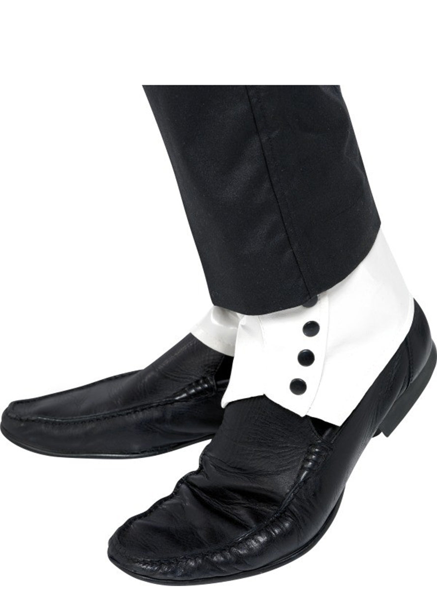 Collants blancs des boutons noirs