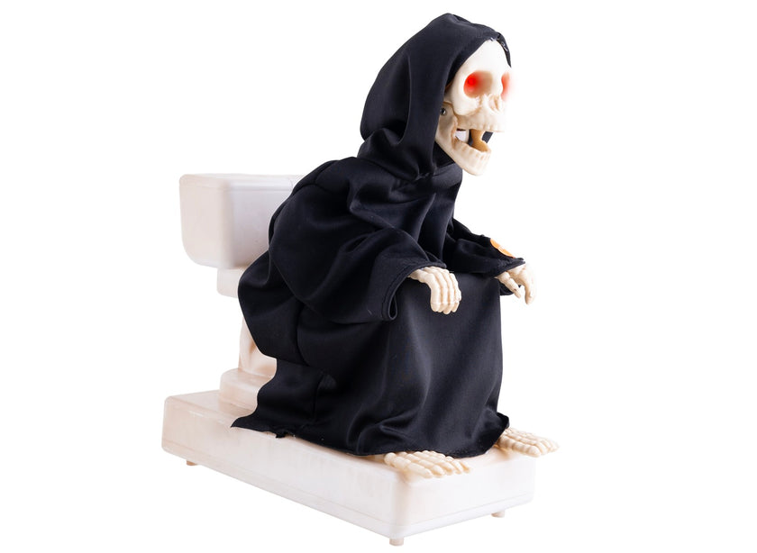 squelette moine sur toilettes lumineux sonore et motorisé 35cm